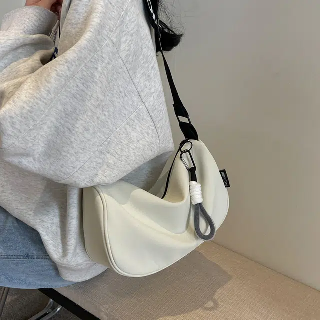 普乐威 高颜值简约时尚百搭小众通勤 布 单肩包 男女同款情侣款 白蓝/白黑/黑色