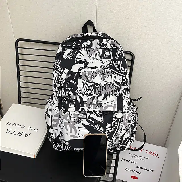 普乐威 时尚个性涂鸦初中大学生高颜值潮牌休闲百搭背包大容量高中 尼龙 双肩包 常规 男女同款情侣款 灰色/绿色/粉色/蓝色
