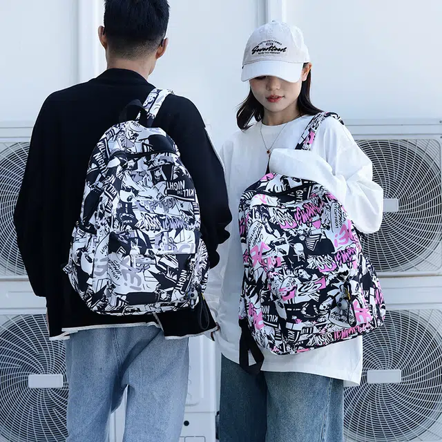 普乐威 时尚个性涂鸦初中大学生高颜值潮牌休闲百搭背包大容量高中 尼龙 双肩包 常规 男女同款情侣款 灰色/绿色/粉色/蓝色