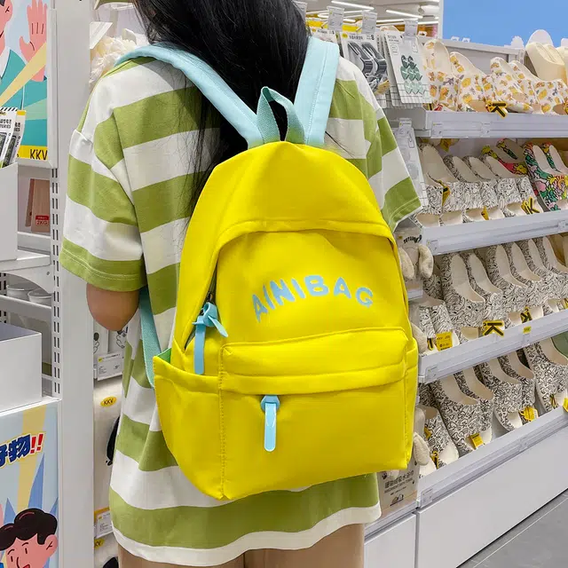 科物酷 轻便背包简约风韩版少女初中生大学生大容量休闲旅行通勤 尼龙 双肩包 男女同款情侣款 黄色/湖蓝色