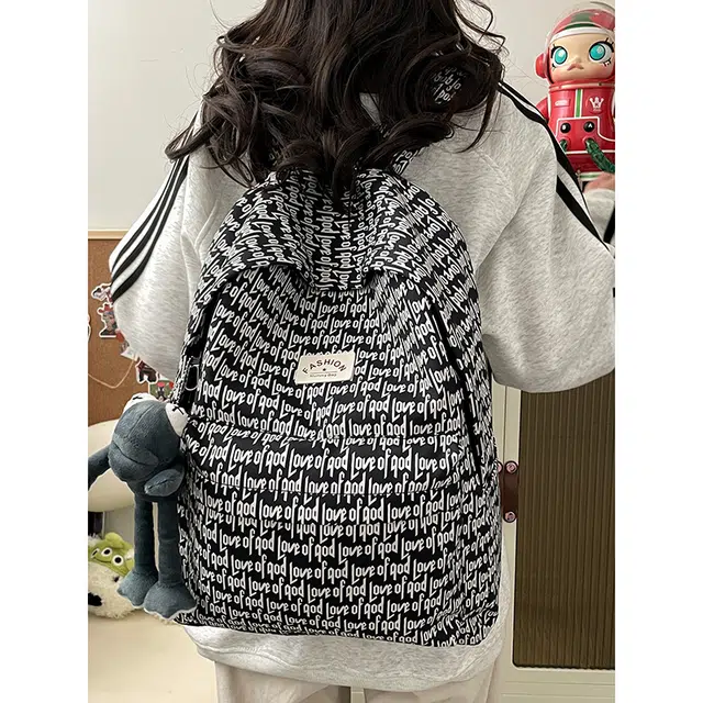 科物酷 高颜值书包美式潮流印花字母大学生初中高中男生时尚休闲通勤旅行大容量背包 尼龙 双肩包 男女同款情侣款 黑色