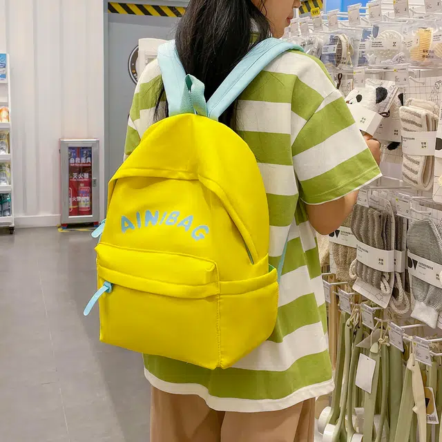 科物酷 轻便背包简约风韩版少女初中生大学生大容量休闲旅行通勤 尼龙 双肩包 男女同款情侣款 黄色/湖蓝色