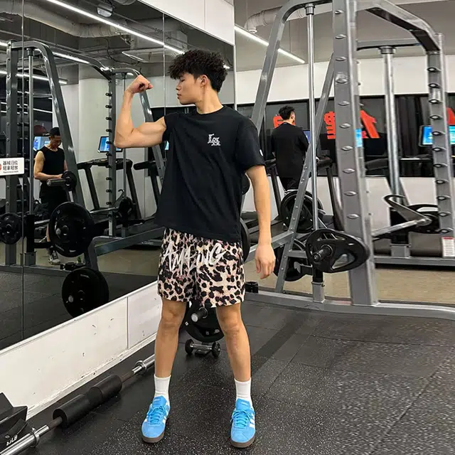 费尔岛上的猫 动物系列美式豹纹时尚舒适透气百搭休闲短裤 男女同款