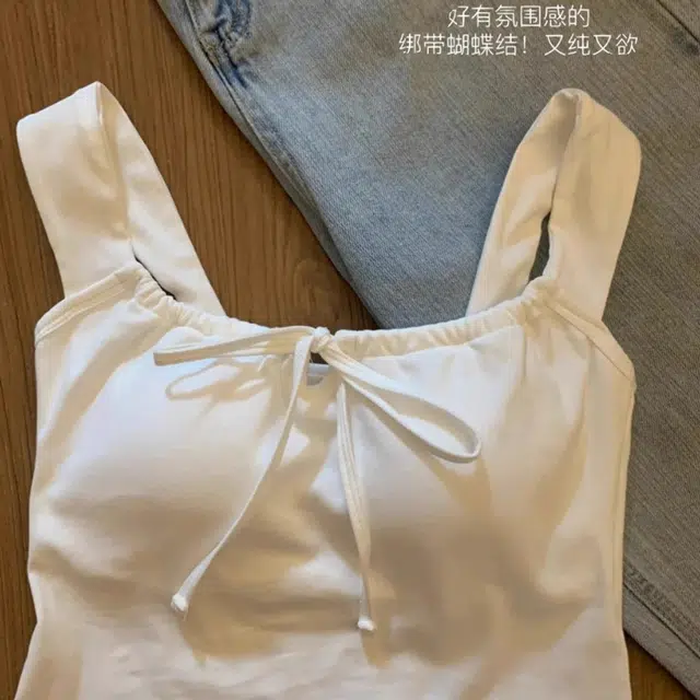 蒄趣 纯色带胸垫简约不规则设计感背心 女款