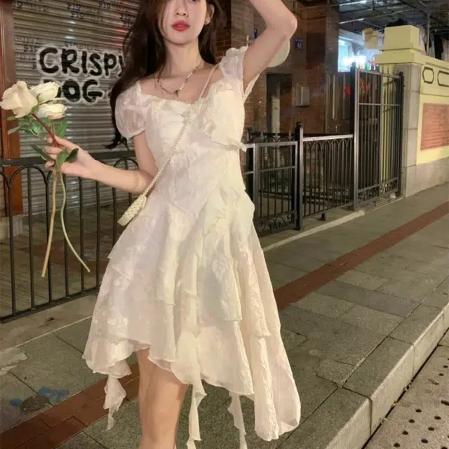 纤丝鸟 茶歇法式不规则裙摆设计感优雅海边度假风公主裙短袖连衣裙 女款