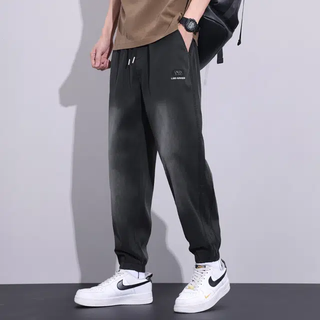 华夏儿女 宽松束脚薄款垂感速干休闲哈伦运动夏季牛仔裤 男女同款