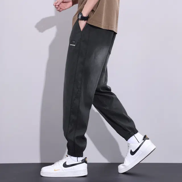华夏儿女 宽松束脚薄款垂感速干休闲哈伦运动夏季牛仔裤 男女同款