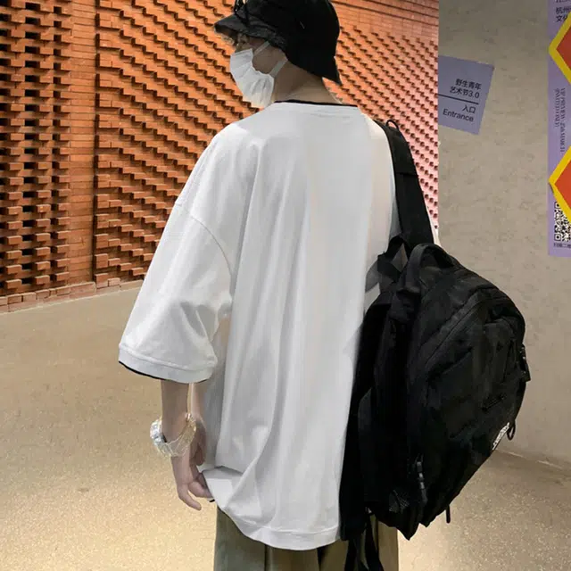 NXNM T
