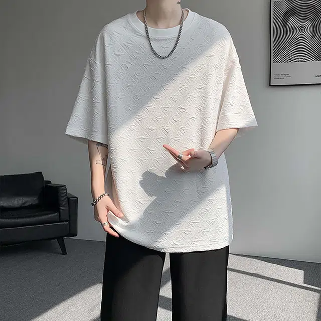 NXNM T
