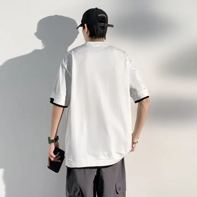 NXNM T