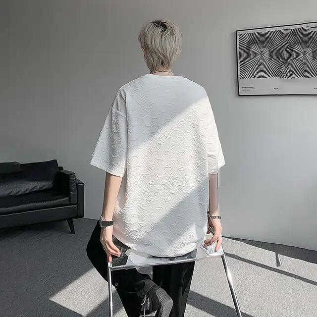 NXNM T