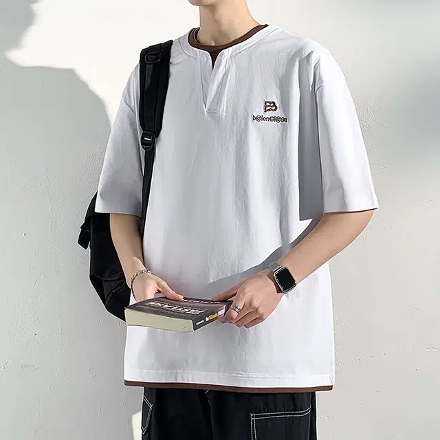 NXNM T