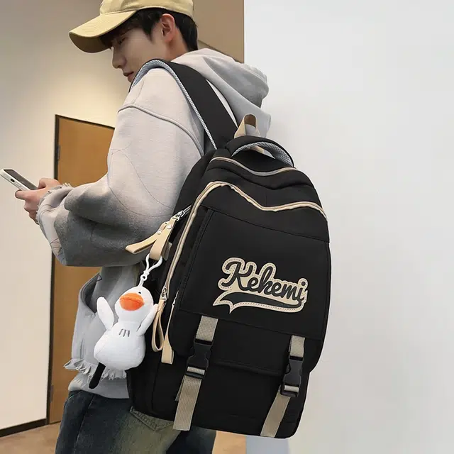 行途 初高中学生书包大容量背包潮流休闲电脑包校园百搭尼龙字母双肩包 男女同款 多色