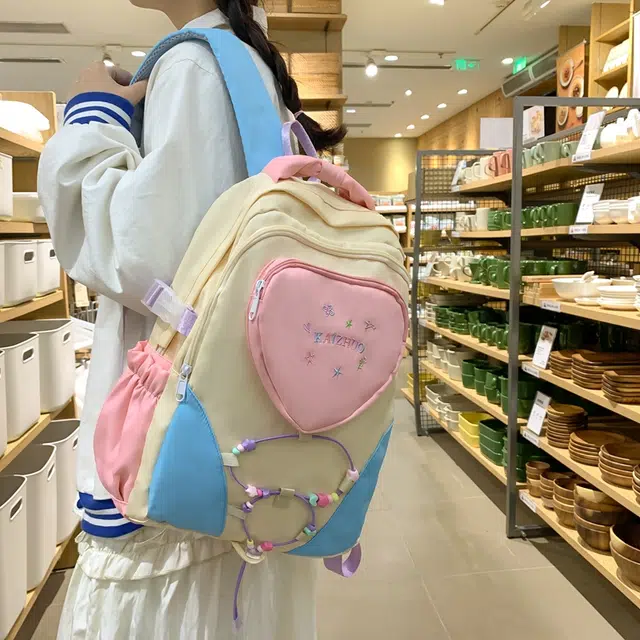行途 书包可爱爱心大容量休闲百搭背包 尼龙 双肩包 常规 男女同款情侣款 粉色/白色