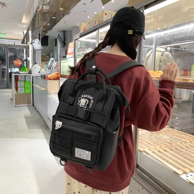 行途 百搭学院风高颜值 尼龙 双肩包 常规 女款 黑色/白色/黄色