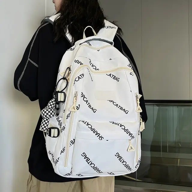 行途 简约旅行轻便休闲百搭 尼龙 双肩包 男女同款情侣款 黑色/白色/蓝色/卡其色