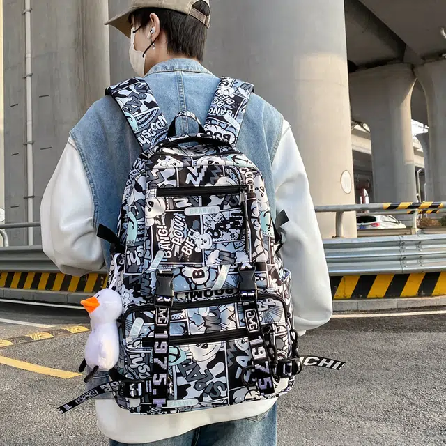行途 学生大容量初高中校园轻便减压外出旅行 尼龙 双肩包 男女同款情侣款 黑色/红色/蓝色/紫色