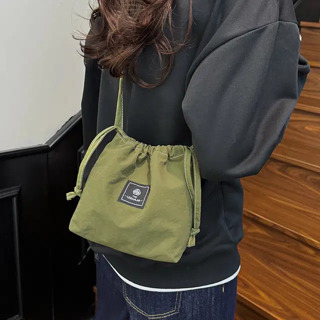 行途 高级感小众时尚超火 水洗布 斜挎包 男女同款情侣款 多色