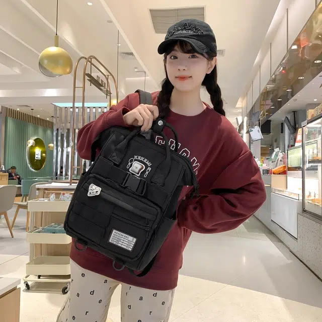 行途 百搭学院风高颜值 尼龙 双肩包 常规 女款 黑色/白色/黄色