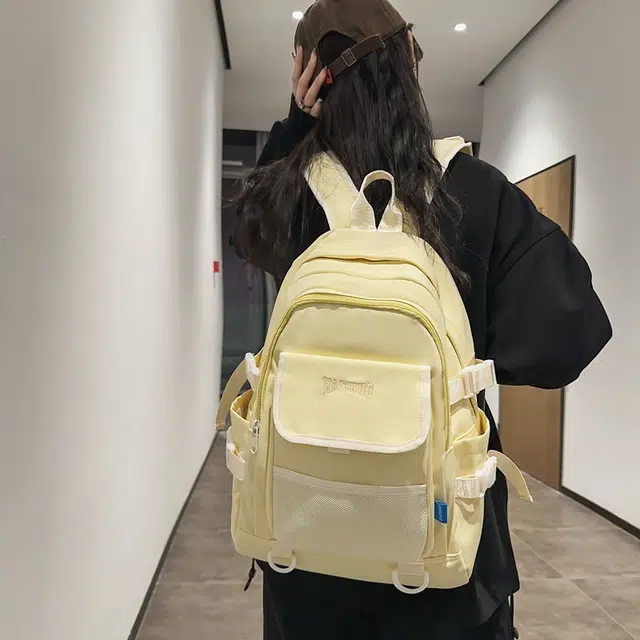 行途 韩版学生书包初高中生简约背包高颜值纯色 尼龙 双肩包 常规 男女同款情侣款 黑色/白色/绿色/黄色