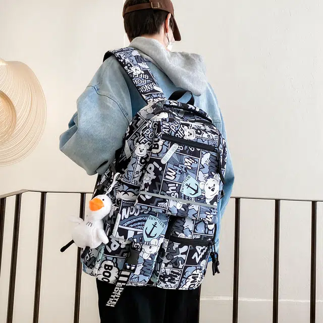 行途 潮酷时尚迷彩涂鸦校园背包港风大学生书包潮 尼龙 双肩包 常规 男女同款情侣款 黑色/红色/蓝色/紫色