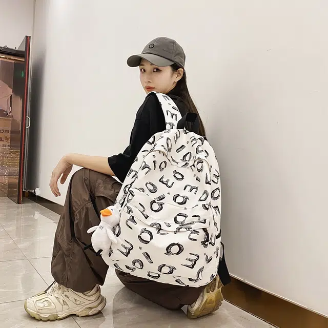 行途 书包大容量高颜值简约小众涂鸦 尼龙 双肩包 男女同款情侣款 多色