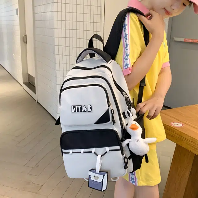 行途 韩版简约大容量中学生初中生减负高中 尼龙 双肩包 女款 黑色/桔色/红色/卡其色/绿色