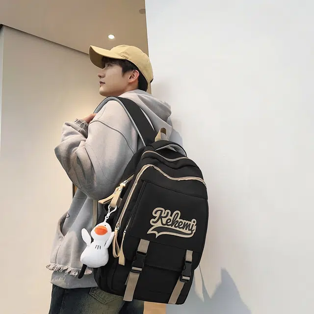 行途 初高中学生书包大容量背包潮流休闲电脑包校园百搭尼龙字母双肩包 男女同款 多色