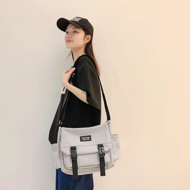 行途 日系原宿复古百搭 尼龙 斜挎包 男女同款情侣款 黑色/白色/灰色