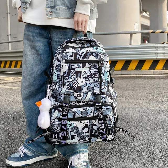 行途 学生大容量初高中校园轻便减压外出旅行 尼龙 双肩包 男女同款情侣款 黑色/红色/蓝色/紫色