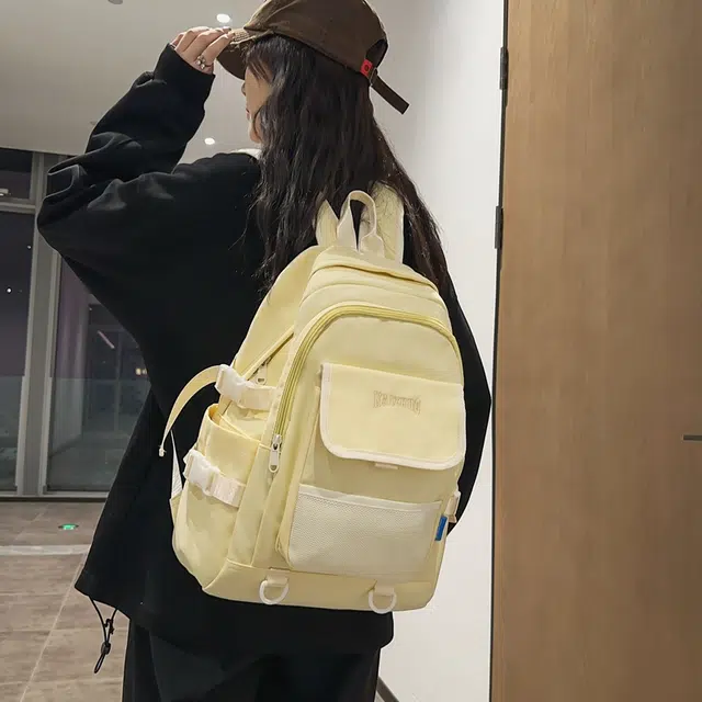 行途 韩版学生书包初高中生简约背包高颜值纯色 尼龙 双肩包 常规 男女同款情侣款 黑色/白色/绿色/黄色