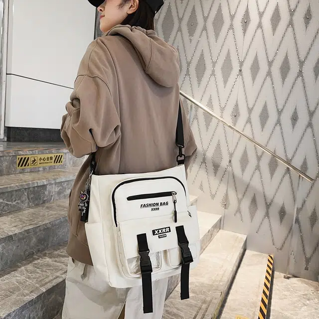 行途 潮牌日系百搭邮差包大容量休闲上课单肩包潮 棉 斜挎包 男女同款情侣款 黑色/白色/卡其色/蓝色/红色