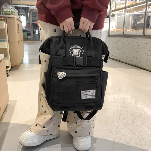 行途 百搭学院风高颜值 尼龙 双肩包 常规 女款 黑色/白色/黄色