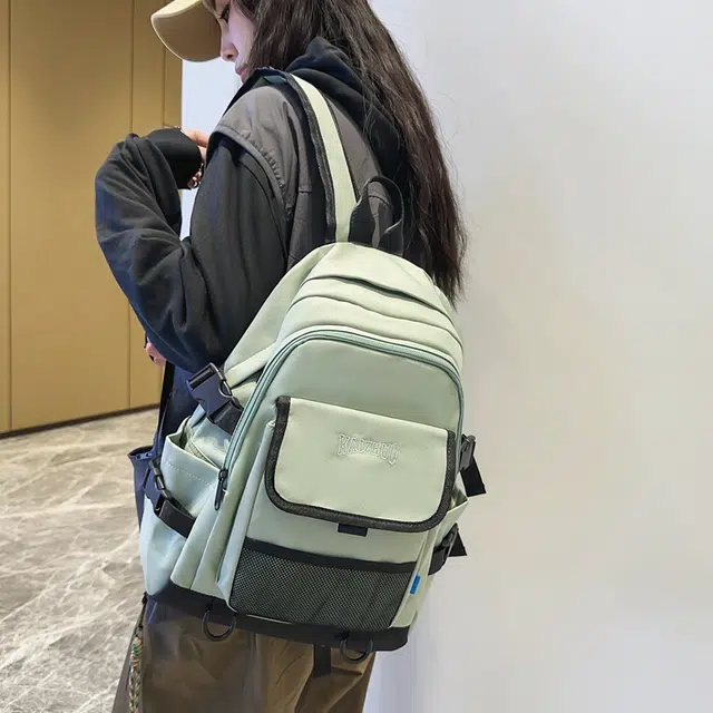 行途 韩版学生书包初高中生简约背包高颜值纯色 尼龙 双肩包 常规 男女同款情侣款 黑色/白色/绿色/黄色