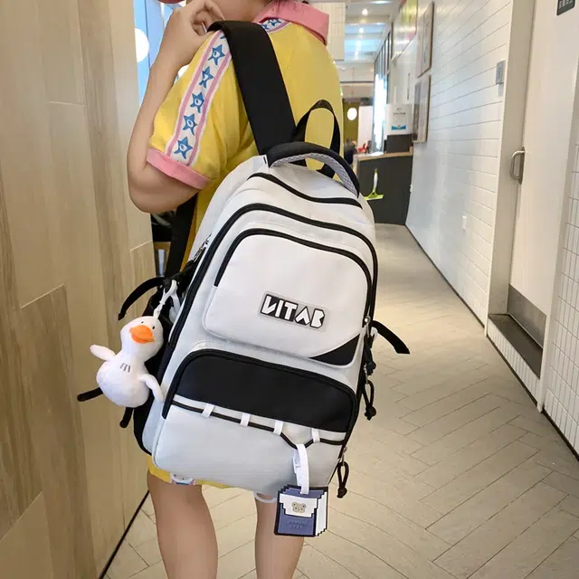 行途 韩版简约大容量中学生初中生减负高中 尼龙 双肩包 女款 黑色/桔色/红色/卡其色/绿色