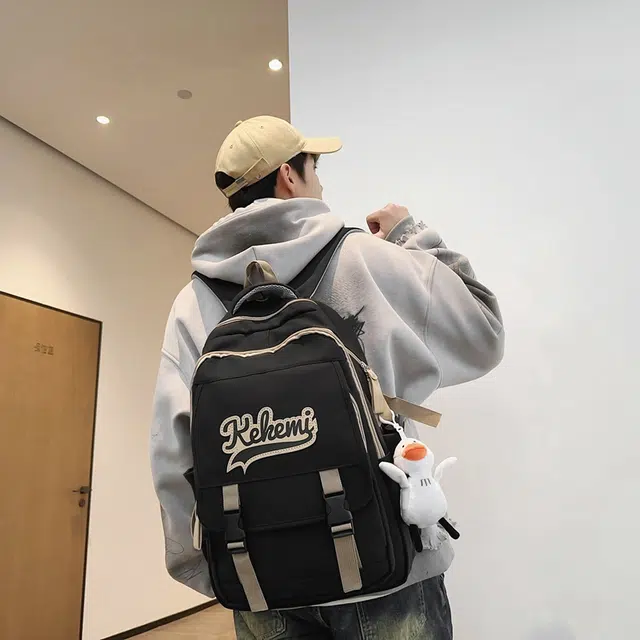 行途 初高中学生书包大容量背包潮流休闲电脑包校园百搭尼龙字母双肩包 男女同款 多色