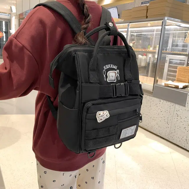 行途 百搭学院风高颜值 尼龙 双肩包 常规 女款 黑色/白色/黄色