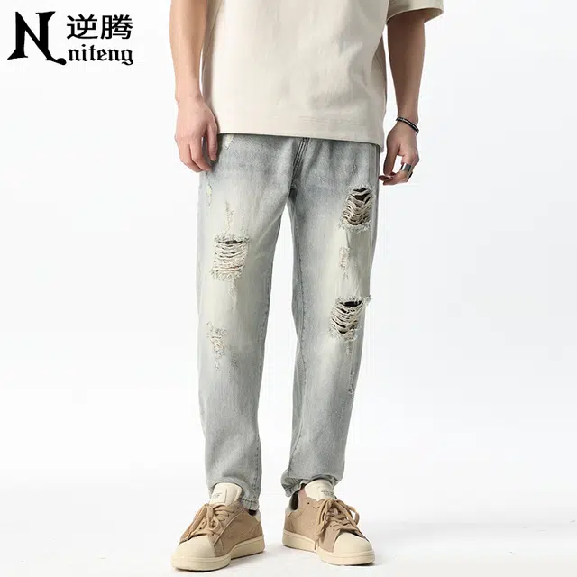逆腾 潮牌破洞中腰宽松牛仔裤 男款 浅蓝色