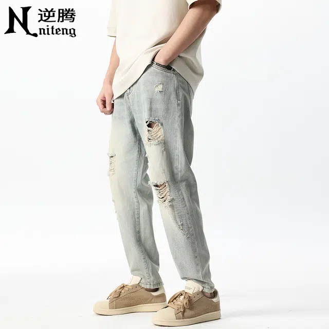 逆腾 潮牌破洞中腰宽松牛仔裤 男款 浅蓝色