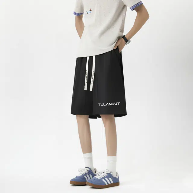 图兰朵 夏季复古潮流痞帅纯色高街简约设计时尚宽松无束缚感经典松紧抽绳系带百搭薄款凉爽随性自在户外运动休闲短裤 男女同款