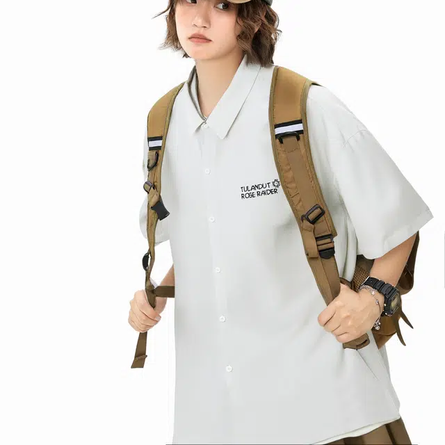 图兰朵 夏季薄款凉感清新复古基础款纯色极简柔软太阳字母高级感落肩单排扣垂感舒适百搭潮流通勤直筒休闲运动短袖衬衫 男女同款