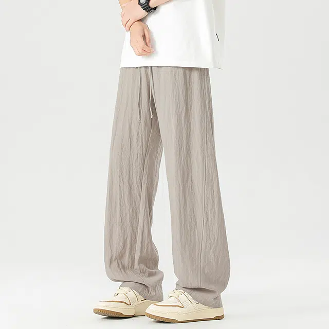 帝狼牛 美式山系户外轻便薄款宽松舒适弯刀运动风休闲裤 男女同款