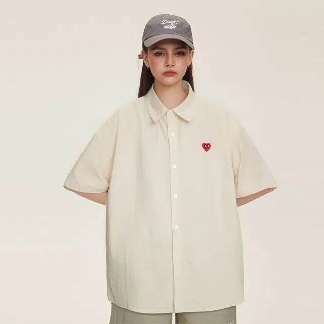 DIBINSAI STUDIO x CHARLES JANG'S HAPPY HEART Logo
