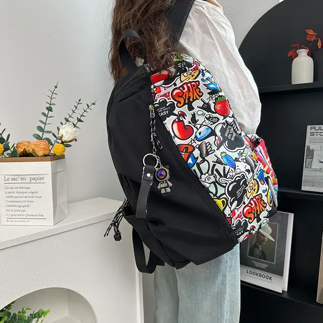 雅鹿 潮流涂鸦书包学生高颜值小众高中生甜酷 尼龙 双肩包背包 男女同款情侣款 白色/黑色/绿色