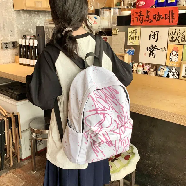 雅鹿 涂鸦印花百搭防水通勤 尼龙 双肩包 男女同款情侣款 多色