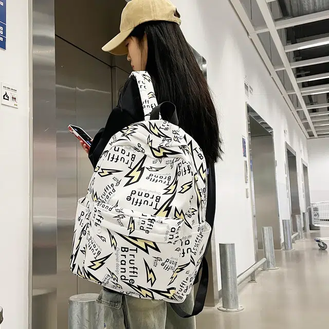 雅鹿 美式个性涂鸦日系风闪电图案字母款印花时尚百搭轻便 尼龙 双肩包 男女同款情侣款 白色/灰色/黑色