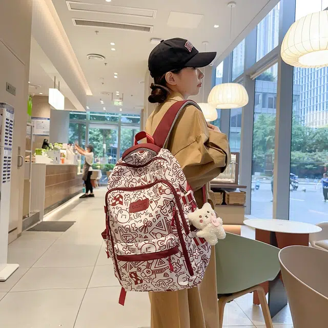 雅鹿 森系高颜值涂鸦大容量百搭耐脏 尼龙 双肩包 男女同款情侣款 黑色/红色/蓝色/绿色