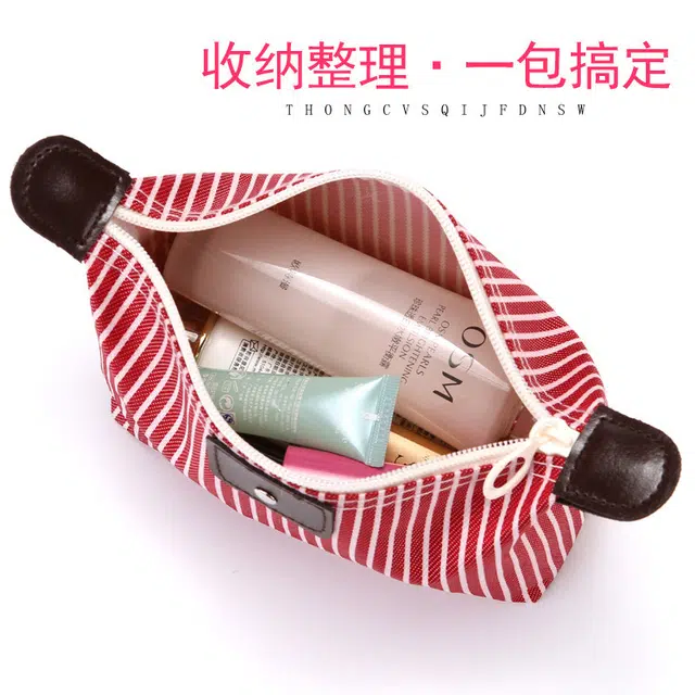 舒小奢便携化妆包女士防水化妆品收纳包大容量便携洗漱包韩版条纹饺子包便利便捷携带方便轻巧轻便 防尘防摔防泼水