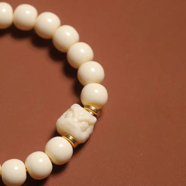 嫒柯 国潮新中式 百搭轻奢高级文玩 万事如意 心想事成 财源滚滚 象牙果 手串 男女同款情侣款