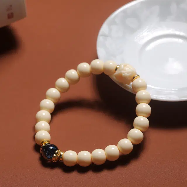 嫒柯 国潮新中式 百搭轻奢高级文玩 万事如意 心想事成 财源滚滚 象牙果 手串 男女同款情侣款